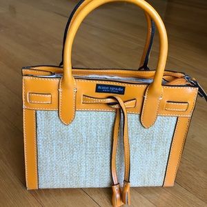 Kate spade woven purse with orange trim